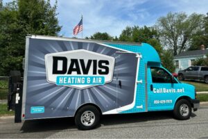Davis Heating and Air branded vehicle delivering a new HVAC system to a local veteran for free